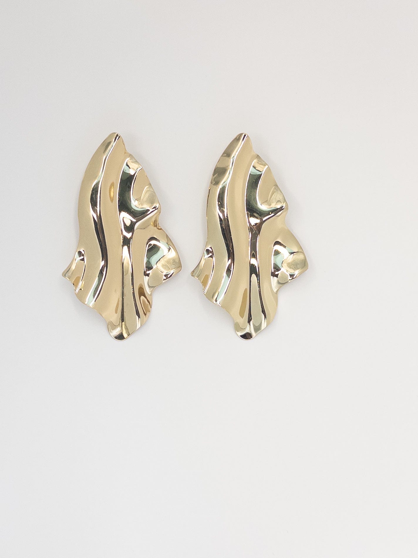 Chic Baubles never disappoints! The Gold Textured Abstract Earrings are a testament to their commitment to quality and design.